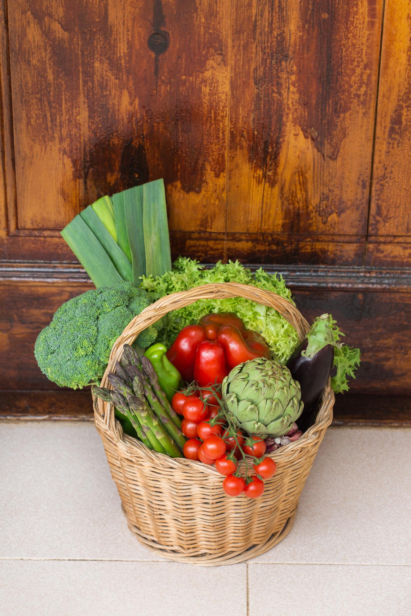 Close-up of fresh vegetables in a wicker basket